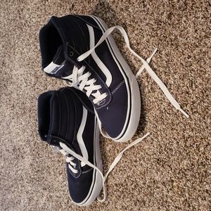 Vans-high top style in navy blue and white, size 4.5 youth